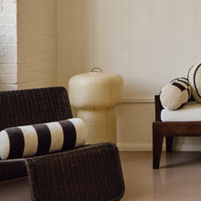 Load image into Gallery viewer, Lifestyle shot of cream and brown cotton corduroy checkered square cushion on wavy rattan chair