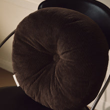 Load image into Gallery viewer, Close up shot of brown cotton corduroy round cushion on chair