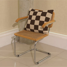 Load image into Gallery viewer, Cream and brown wool bouclé checkered square cushion on chair - handmade in UK