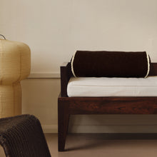 Load image into Gallery viewer, Brown and cream wool bouclé piped bolster cushion on daybed - handmade in UK