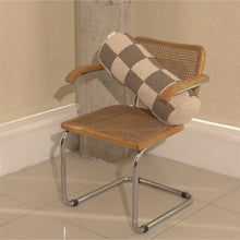 Load image into Gallery viewer, Cream and beige wool bouclé checkered bolster cushion on chair - handmade in UK
